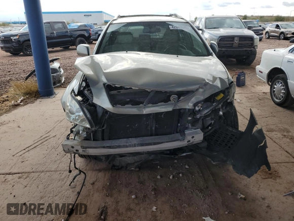 2007 Lexus RX 400h z VIN JTJGW31U972001465, wystawiony jako Copart lot #42049045 z przebiegiem 75 325 mil mil oraz Szkody całkowita. Historia ofert i sprzedaży dostępna na DreamBid. Obrazek 5.