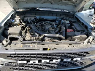 2021 Ford Bronco z VIN 1FMEE5DP1MLB07165, wystawiony jako Copart lot #59050885 z przebiegiem 49 044 mil mil oraz Szkoda całkowita • Salvage title. Historia ofert i sprzedaży dostępna na DreamBid. Obrazek 11.
