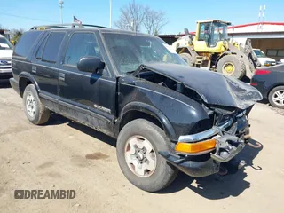 2002 Chevrolet Blazer LS z VIN 1GNDT13W22K220656, wystawiony jako IAAI lot #41736429 z przebiegiem Nie podano mil oraz . Historia ofert i sprzedaży dostępna na DreamBid. Obrazek 1.