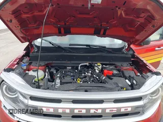2024 Ford Bronco z VIN 3FMCR9K69RRF45079, wystawiony jako IAAI lot #42009210 z przebiegiem 3 267 mil mil oraz . Historia ofert i sprzedaży dostępna na DreamBid. Obrazek 10.