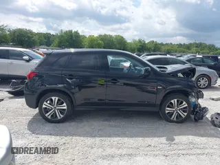 2023 Mitsubishi Outlander ES z VIN JA4ARUAU2PU014515, wystawiony jako IAAI lot #42147345 z przebiegiem 43 489 mil mil oraz . Historia ofert i sprzedaży dostępna na DreamBid. Obrazek 14.