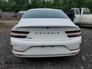 2023 Genesis G80 z VIN KMTGE4S18PU006369, wystawiony jako Copart lot #57445225 z przebiegiem 25 083 mil mil oraz Szkody całkowita. Historia ofert i sprzedaży dostępna na DreamBid. Obrazek 6.