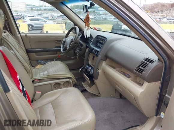 2006 Honda CR-V EX SE z VIN JHLRD78956C038888, wystawiony jako IAAI lot #42274712 z przebiegiem 143 633 mil mil oraz . Historia ofert i sprzedaży dostępna na DreamBid. Obrazek 5.