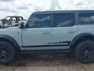 2021 Ford Bronco with VIN 1FMEE5DP6MLA61655, listed as a IAAI auction lot 42492762 with 88,313 mi miles and . Bid and sale history available at DreamBid. Image 14.