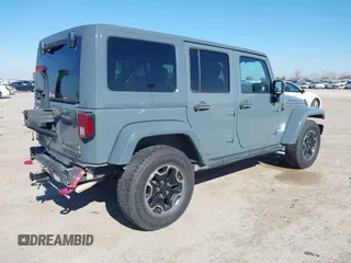 2015 Jeep Wrangler Unlimited Rubicon with VIN 1C4BJWFG7FL525724, listed as a IAAI auction lot 41394059 with 132,058 mi miles. Bid and sale history available at carsss.com. Image 4.