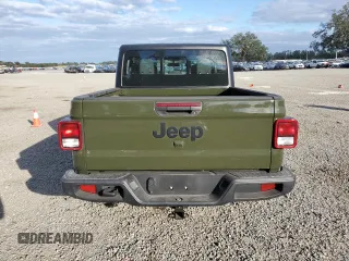 2024 Jeep Gladiator Sport z VIN 1C6HJTAG6RL102290, wystawiony jako Copart lot #81331014 z przebiegiem 9 930 mil mil oraz Szkoda całkowita • Salvage title. Historia ofert i sprzedaży dostępna na DreamBid. Obrazek 6.