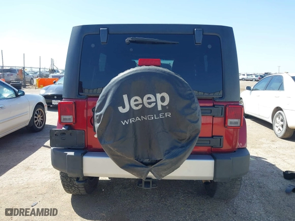 2011 Jeep Wrangler Unlimited Sahara with VIN 1J4BA5H15BL557871, listed as a IAAI auction lot 41922328 with 206,581 mi miles. Bid and sale history available at carsss.com. Image 17.