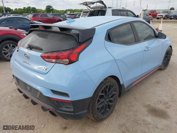 2020 Hyundai Veloster N with VIN KMHT36AH6LU004705, listed as a IAAI auction lot 42014151 with 155,813 mi miles. Bid and sale history available at carsss.com. Image 4.