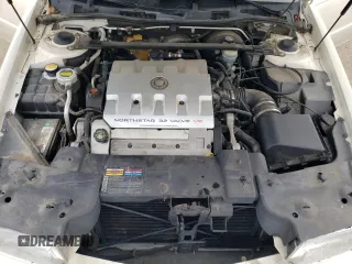 2001 Cadillac Eldorado Touring ETC z VIN 1G6ET12921B103685, wystawiony jako Copart lot #84565144 z przebiegiem 99 265 mil mil oraz Szkoda całkowita • Salvage title. Historia ofert i sprzedaży dostępna na DreamBid. Obrazek 11.