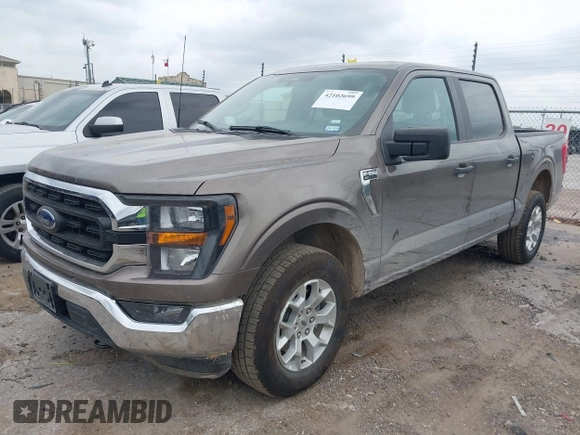 2023 Ford F-150 XL with VIN 1FTFW1E81PFB71702, listed as a IAAI auction lot 42102699 with 57,007 mi miles. Bid and sale history available at carsss.com. Image 17.