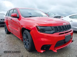 2017 Jeep Grand Cherokee SRT z VIN 1C4RJFDJXHC670370, wystawiony jako IAAI lot #41524965 z przebiegiem 87 276 mil mil oraz . Historia ofert i sprzedaży dostępna na DreamBid. Obrazek 1.