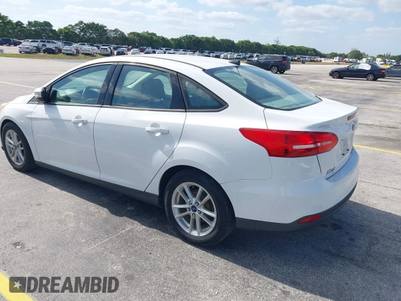 2015 Ford Focus SE with VIN 1FADP3F23FL329375, listed as a IAAI auction lot 42170945 with 114,180 mi miles. Bid and sale history available at carsss.com. Image 3.