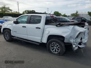 2022 GMC Canyon 4WD AT4 z VIN 1GTG6FEN0N1164841, wystawiony jako Copart lot #54440155 z przebiegiem 31 658 mil mil oraz Szkoda całkowita • Salvage title. Historia ofert i sprzedaży dostępna na DreamBid. Obrazek 2.