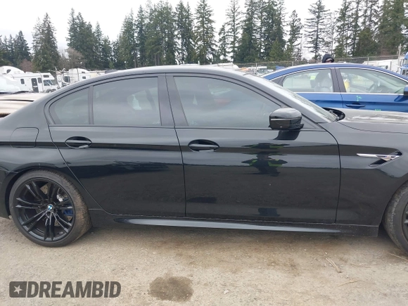 2020 BMW M5 Competition z VIN WBSJF0C08LCD72764, wystawiony jako IAAI lot #41739116 z przebiegiem 36 013 mil mil oraz . Historia ofert i sprzedaży dostępna na DreamBid. Obrazek 13.