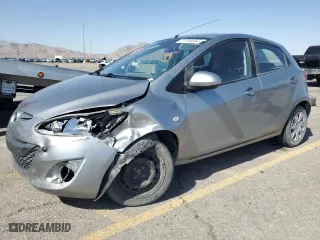 2012 Mazda Mazda2 Sport with VIN JM1DE1KZXC0152070, listed as a Copart auction lot 71793854 with 127,833 mi miles and Salvage Title. Bid and sale history available at carsss.com. Image 1.
