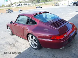 1997 Porsche 911 with VIN WP0AA2998VS322699, listed as a IAAI auction lot 41892833 with 117,174 mi miles and . Bid and sale history available at DreamBid. Image 3.