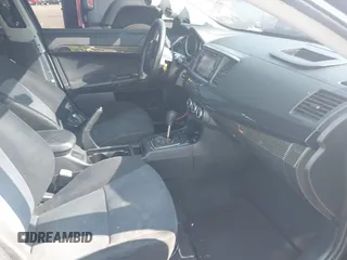 2014 Mitsubishi Lancer GT with VIN JA32U8FW6EU015415, listed as a IAAI auction lot 40171318 with 40,000 mi miles. Bid and sale history available at carsss.com. Image 5.