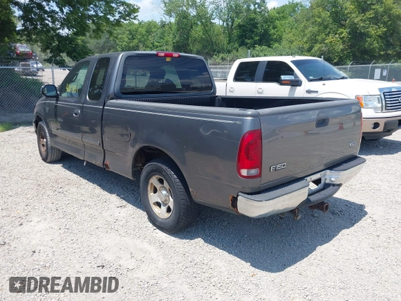 2002 Ford F-150 XL with VIN 1FTRX17W22NA43571, listed as a IAAI auction lot 42697861 with Not provided miles and . Bid and sale history available at DreamBid. Image 3.