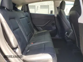 2022 Tesla Model Y Performance z VIN 7SAYGDEF2NF443037, wystawiony jako Copart lot #56870145 z przebiegiem 51 897 mil mil oraz Szkoda całkowita • Salvage title. Historia ofert i sprzedaży dostępna na DreamBid. Obrazek 11.