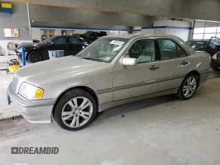 1999 Mercedes-Benz C 230/260/280/320 with VIN WDBHA24G7XA740618, listed as a Copart auction lot 78695104 with 144,512 mi miles and Salvage Title. Bid and sale history available at carsss.com. Image 1.