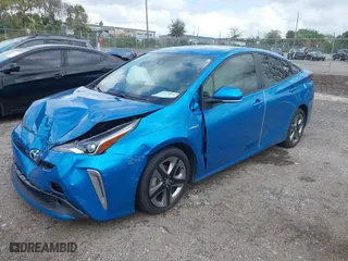 2022 Toyota Prius L Eco with VIN JTDKAMFU5N3165006, listed as a IAAI auction lot 41753470 with 33,567 mi miles. Bid and sale history available at carsss.com. Image 2.