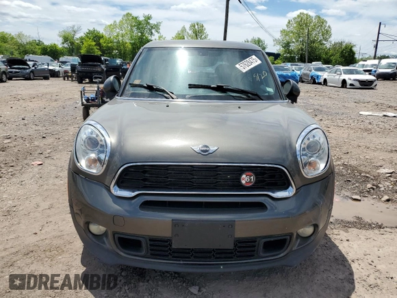 2013 MINI Paceman S ALL4 z VIN WMWSS7C56DWN71592, wystawiony jako Copart lot #57628475 z przebiegiem 83 488 mil mil oraz Szkoda całkowita • Salvage title. Historia ofert i sprzedaży dostępna na DreamBid. Obrazek 5.