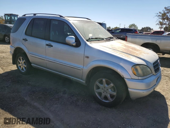 2000 Mercedes-Benz M 320/430/500 with VIN 4JGAB72E5YA173269, listed as a Copart auction lot 71520714 with 239,248 mi miles and Clean title. Bid and sale history available at DreamBid. Image 4.