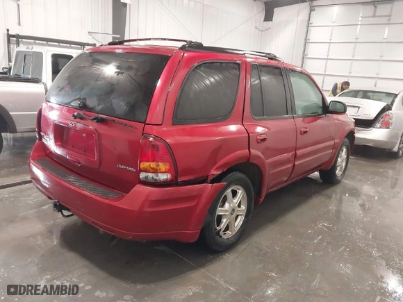 2002 Oldsmobile Bravada with VIN 1GHDT13S822507953, listed as a IAAI auction lot 41365070 with 108,429 mi miles. Bid and sale history available at carsss.com. Image 4.