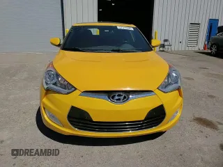 2016 Hyundai Veloster z VIN KMHTC6AD8GU278670, wystawiony jako Copart lot #57315695 z przebiegiem 89 496 mil mil oraz Szkoda całkowita • Salvage title. Historia ofert i sprzedaży dostępna na DreamBid. Obrazek 13.
