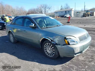 2005 Mercury Montego Premier with VIN 1MEFM42165G618285, listed as a IAAI auction lot 41595913 with 127,811 mi miles. Bid and sale history available at carsss.com. Image 1.