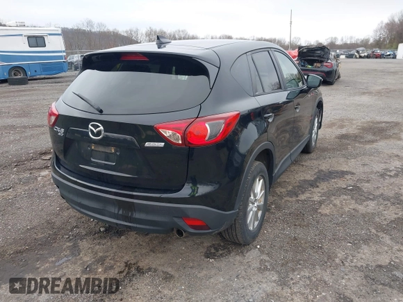 2016 Mazda CX-5 Touring with VIN JM3KE4CY4G0738713, listed as a IAAI auction lot 41998597 with 146,595 mi miles and . Bid and sale history available at carsss.com. Image 4.