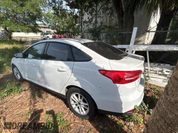 2015 Ford Focus SE with VIN 1FADP3F21FL338821, listed as a Copart auction lot 62089035 with 84,648 mi miles and Salvage title. Bid and sale history available at DreamBid. Image 3.