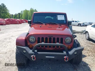2007 Jeep Wrangler Unlimited Sahara with VIN 1J4GA59187L116585, listed as a IAAI auction lot 41996297 with 151,961 mi miles and . Bid and sale history available at DreamBid. Image 12.