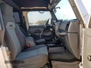 2005 Jeep Wrangler X с VIN 1J4FA39S45P353119, выставлен на аукционе Copart как лот 64206825 с пробегом 134 298 миль миль и Списание • Salvage title. История ставок и продаж доступна на DreamBid. Изображение 7.