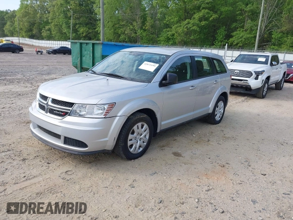 2014 Dodge Journey SE with VIN 3C4PDCAB0ET139916, listed as a IAAI auction lot 42072199 with 92,591 mi miles and . Bid and sale history available at DreamBid. Image 2.