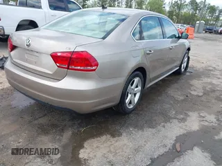 2015 Volkswagen Passat 1.8T Limited Edition with VIN 1VWAT7A32FC120769, listed as a IAAI auction lot 42013547 with 61,451 mi miles. Bid and sale history available at carsss.com. Image 4.