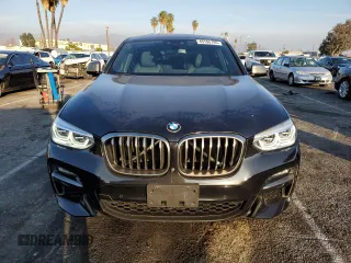 2020 BMW X4 M40i with VIN 5UX2V5C0XL9B53828, listed as a Copart auction lot 43190795 with 55,374 mi miles and Salvage title. Bid and sale history available at DreamBid. Image 5.