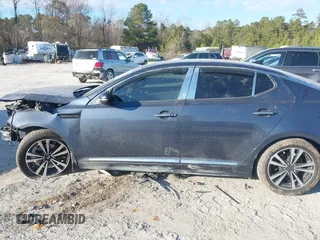 2015 Kia Optima EX with VIN 5XXGN4A71FG426726, listed as a IAAI auction lot 41341272 with 114,298 mi miles. Bid and sale history available at carsss.com. Image 14.