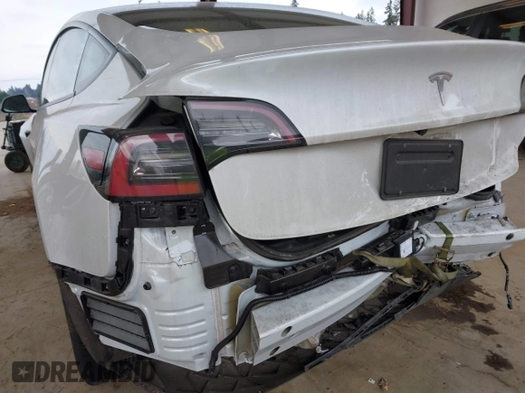 2023 Tesla Model 3 z VIN 5YJ3E1EA8PF412166, wystawiony jako IAAI lot #41461983 z przebiegiem 25 908 mil mil oraz . Historia ofert i sprzedaży dostępna na DreamBid. Obrazek 6.