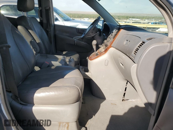2007 Kia Sedona EX with VIN KNDMB233X76123907, listed as a Copart auction lot 75496494 with 263,694 mi miles and Salvage Title. Bid and sale history available at DreamBid. Image 7.