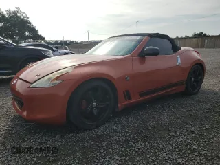 2010 Nissan 370Z Touring with VIN JN1AZ4FH6AM300962, listed as a Copart auction lot 71282214 with 123,860 mi miles and Salvage Title. Bid and sale history available at carsss.com. Image 1.