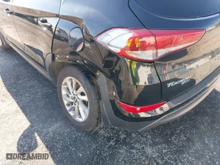 2016 Hyundai Tucson Limited with VIN KM8J33A27GU237225, listed as a IAAI auction lot 41223497 with 158,986 mi miles. Bid and sale history available at carsss.com. Image 6.