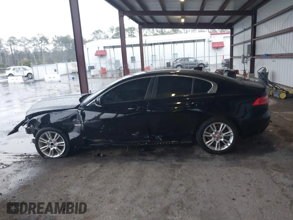 2017 Jaguar XE 25t Premium with VIN SAJAD4BG7HA966895, listed as a IAAI auction lot 41288998 with 158,391 mi miles. Bid and sale history available at carsss.com. Image 14.