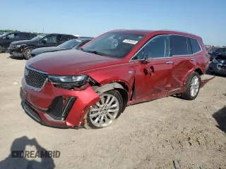 2020 Cadillac XT6 FWD Premium Luxury z VIN 1GYKPCRSXLZ101003, wystawiony jako Copart lot #51844525 z przebiegiem 115 061 mil mil oraz Szkody całkowita. Historia ofert i sprzedaży dostępna na DreamBid. Obrazek 1.