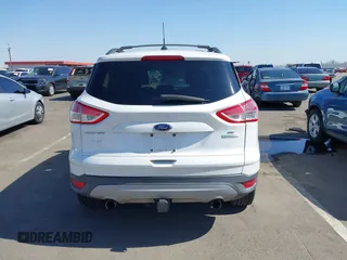 2013 Ford Escape SE with VIN 1FMCU0GX9DUB83638, listed as a IAAI auction lot 42471869 with 213,356 mi miles and . Bid and sale history available at DreamBid. Image 17.