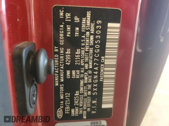 2012 Kia Optima EX with VIN 5XXGN4A77CG053039, listed as a Copart auction lot 48676705 with 114,501 mi miles and Salvage Title. Bid and sale history available at DreamBid. Image 12.
