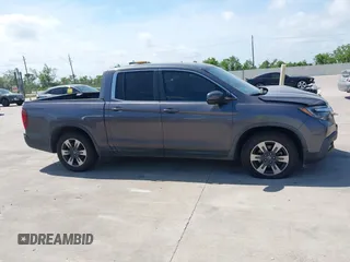 2019 Honda Ridgeline RTL with VIN 5FPYK2F59KB004653, listed as a IAAI auction lot 42066778 with 90,144 mi miles and . Bid and sale history available at DreamBid. Image 13.