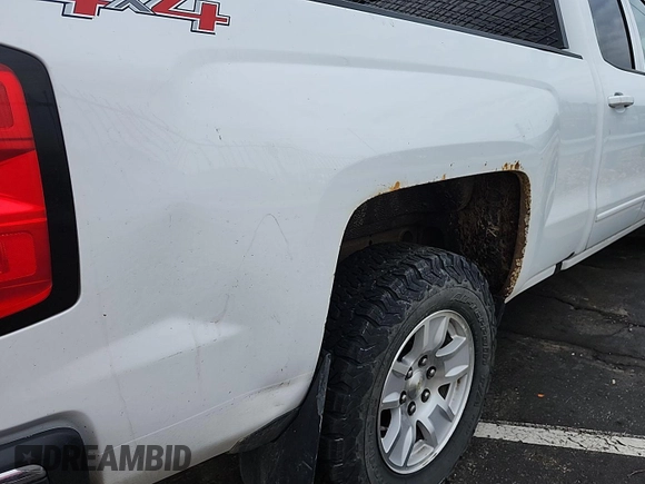 2016 Chevrolet Silverado 1500 LT with VIN 1GCVKREH4GZ346660, listed as a IAAI auction lot 42197452 with 127,410 mi miles. Bid and sale history available at carsss.com. Image 1.