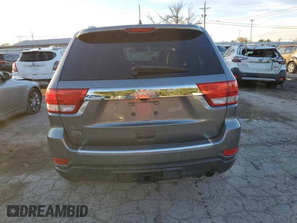 2011 Jeep Grand Cherokee Overland with VIN 1J4RS6GGXBC601757, listed as a Copart auction lot 82770454 with 132,109 mi miles and Salvage Title. Bid and sale history available at DreamBid. Image 6.