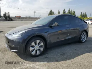 2024 Tesla Model Y Long Range with VIN 7SAYGDEE2RA244242, listed as a Copart auction lot 52635095 with 4,994 mi miles and Salvage title. Bid and sale history available at DreamBid. Image 1.